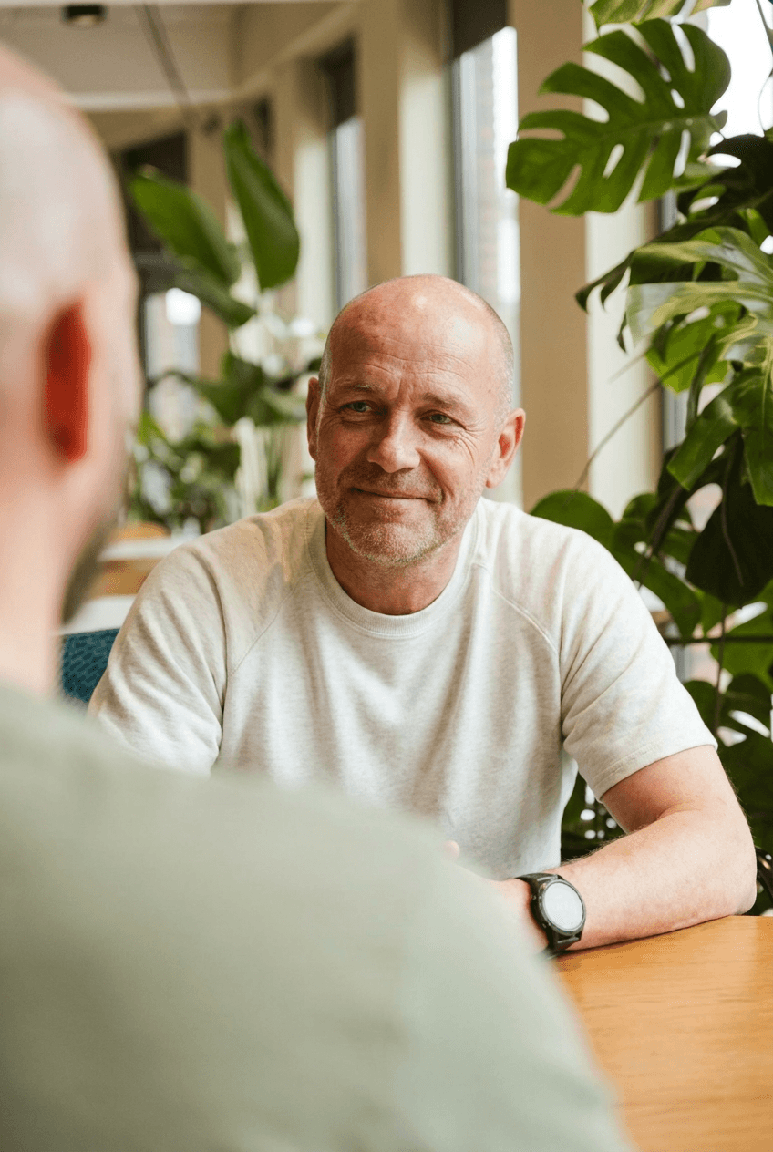 A homeowner discussing an energy-efficient upgrade